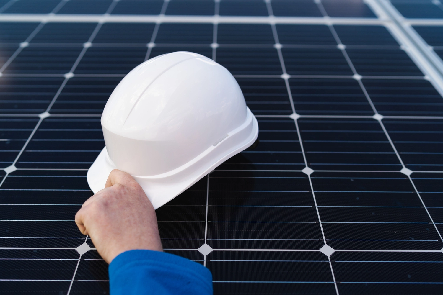 hand-of-the-engineer-takes-the-helmet-that-lies-on-2023-11-27-05-17-46-utc hand-of-the-engineer-takes-the-helmet-that-lies-on-2023-11-27-05-17-46-utc